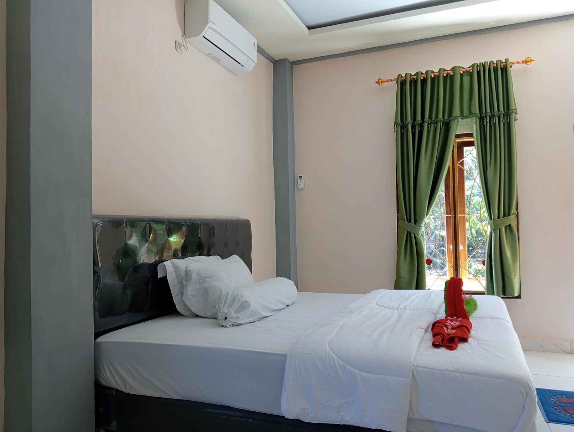 לבואן באג'ו Yusilver Guest House חדר תמונה
